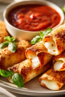 Leckere Pizza Roll Breadsticks: Mozzarella & Tomatensauce!